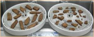 Pieces of meat on dryer tray